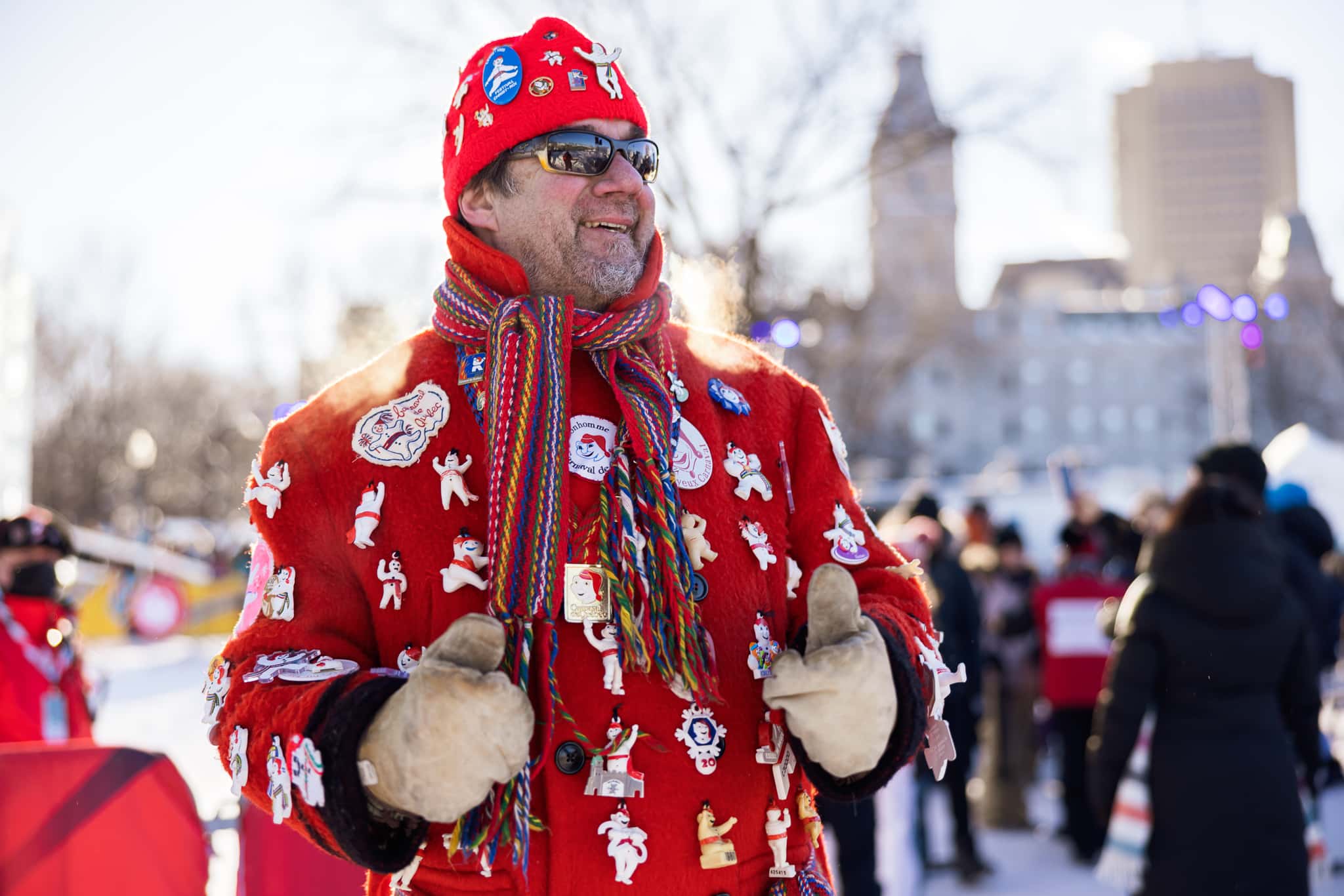 Scarf, knit hat and insulated gloves in the snow